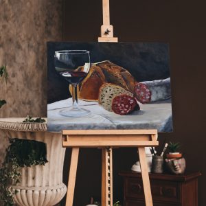 Bread and Wine still life painting red wine glass rustic loaf and salami