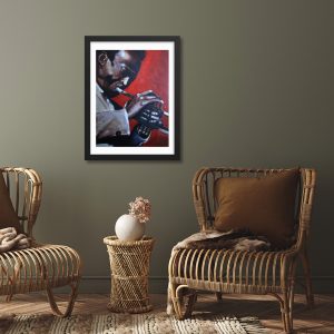 Portrait painting of Miles Davis playing trumpet against a red background